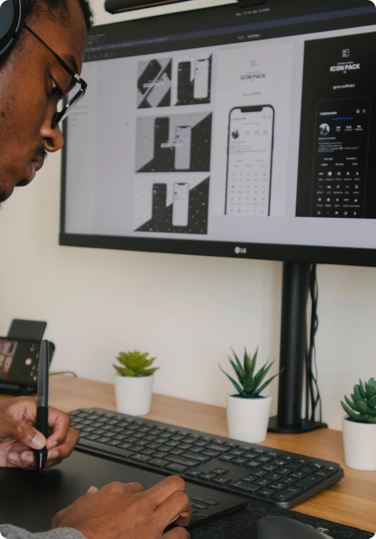 UI UX designer working on multiple screens
